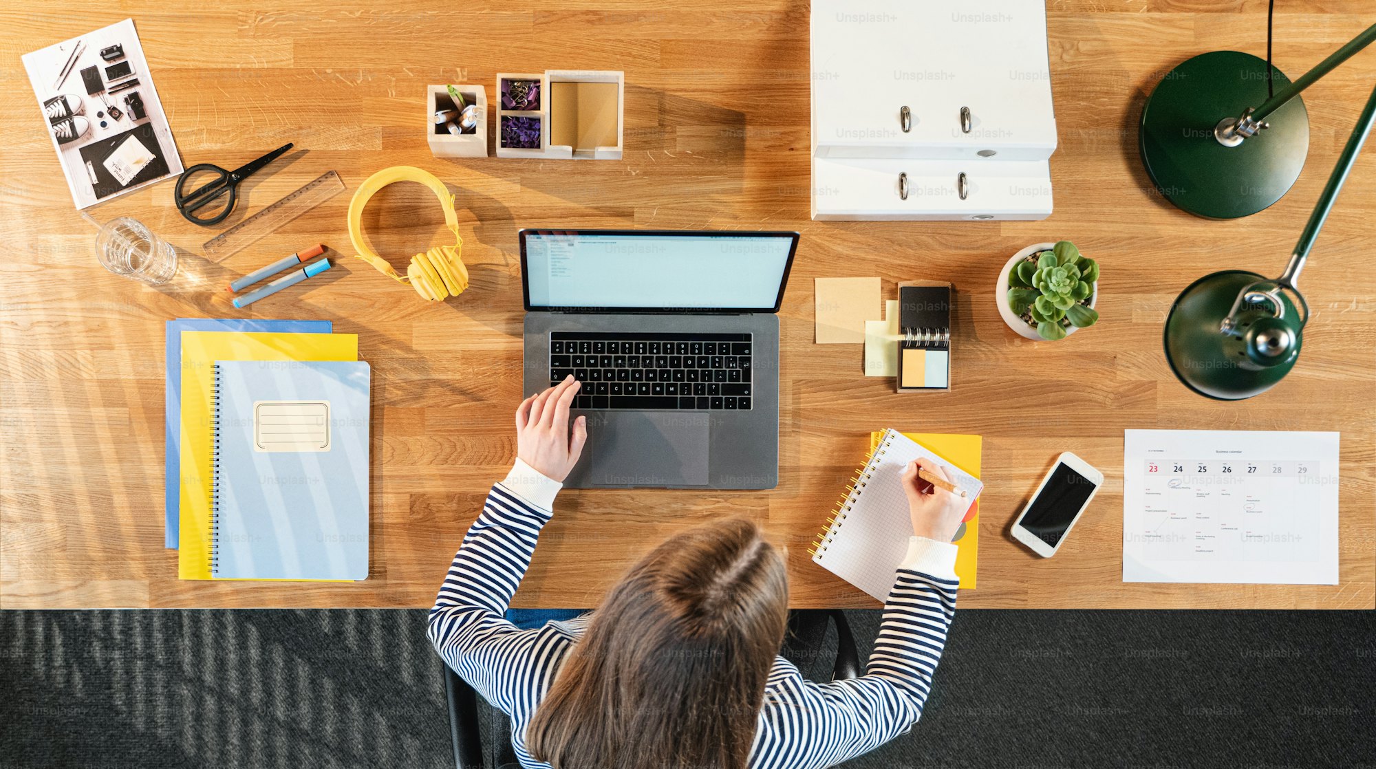 Professional studying an online business course on a laptop
